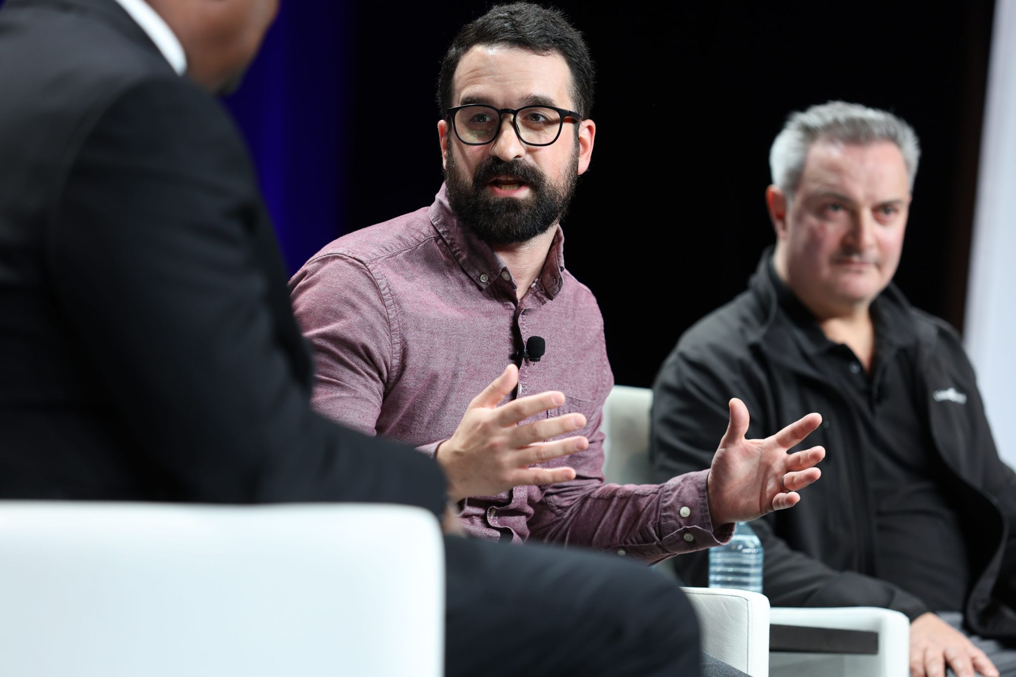 Government professionals discussing AI implementation